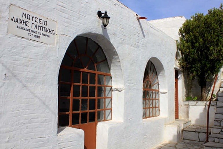 Tinos, Girla, The Festival of the Monastery of Agia Triada - Gastronomy Tours Front of the Monastery of Agia Triada (Holy Trinity) at Tinos, Girla, Greece that commemorate festival of her birth